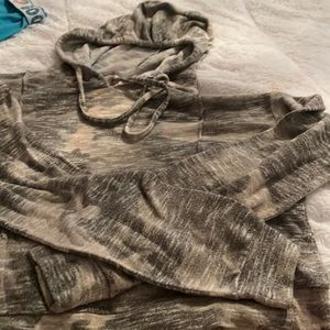 Size is XS, the brand is SO. And this is an army styled sweatshirt.